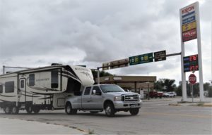 The main intersection in Shoshoni takes travelers north on U.S. Highway 20 to Thermopolis or west on U.S. Highway 26 to Riverton. The intersection plays a role in attempts to revive the community, with residents looking at possible ways to build up businesses in the area. (Photo by Cody Beers, Cowboy State Daily)